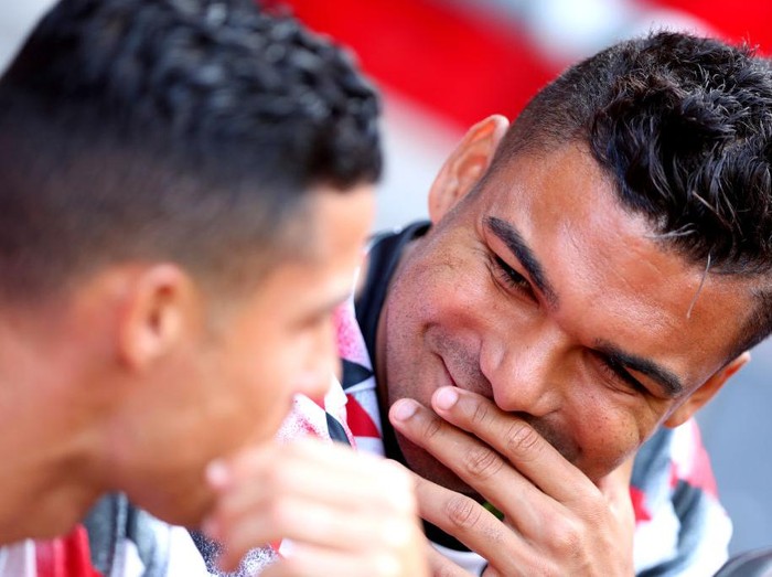 Manchester Uniteds Cristiano Ronaldo (left) speaks to team-mate Casemiro ahead of the Premier League match at St Marys Stadium, Southampton. Picture date: Saturday August 27, 2022. (Photo by Kieran Cleeves/PA Images via Getty Images)