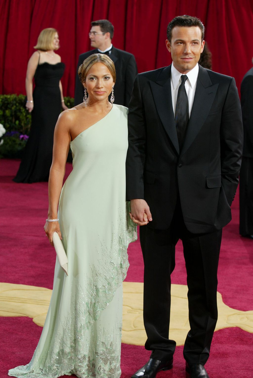 HOLLYWOOD - MARCH 23:  Actors Ben Affleck and fiancee Jennifer Lopez, wearing Harry Winston jewelry, attends the 75th Annual Academy Awards at the Kodak Theater on March 23, 2003 in Hollywood, California.  (Photo by Kevin Winter/Getty Images)
