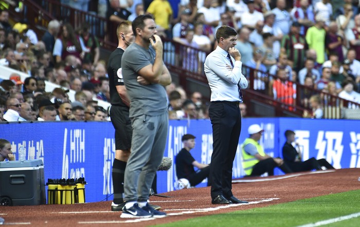Aston Villas head coach Steven Gerrard, right, and Evertons head coach Frank Lampard during the English Premier League soccer match between Aston Villa and Everton at Villa Park in Birmingham, England, Saturday, Aug.13, 2022. (AP Photo/Rui Vieira)