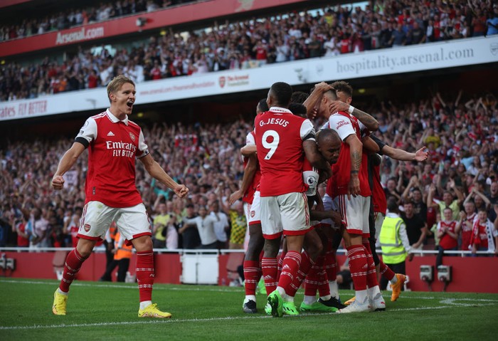 Gabriel Magalhaes LONDON, ENGLAND - AUGUST 27: Martin Odegaard of Arsenal celebrates the goal of Gabriel Magalhaes of Arsenal during their sides second goal with team mates during the Premier League match between Arsenal FC and Fulham FC at Emirates Stadium on August 27, 2022 in London, England. (Photo by Eddie Keogh/Getty Images)