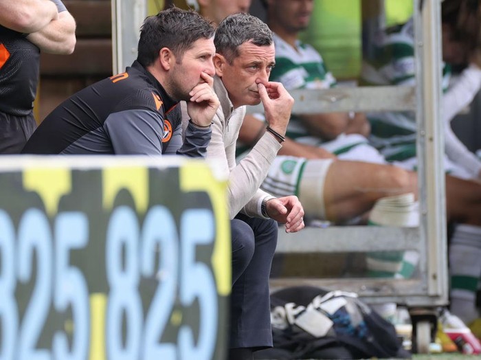 Dundee United manager Jack Ross (right) and assistant Liam Fox watch from the dugout during the cinch Premiership match at Celtic park, Glasgow. Picture date: Sunday August 21, 2022. (Photo by Steve Welsh/PA Images via Getty Images)