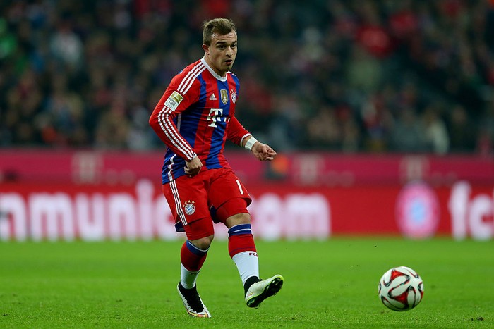 Xherdan Shaqiri MUNICH, GERMANY - DECEMBER 16: Xherdan Shaqiri of Muenchen runs with the ball during the Bundesliga match between FC Bayern Muenchen and SC Freiburg at Allianz Arena on December 16, 2014 in Munich, Germany. (Photo by A. Hassenstein/FC Bayern via Getty Images)