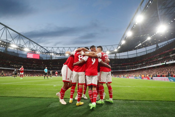 LONDON, ENGLAND - AUGUST 31: Gabriel Jesus of Arsenal scores their sides first goal whilst under pressure from Tyrone Mings of Aston Villa during the Premier League match between Arsenal FC and Aston Villa at Emirates Stadium on August 31, 2022 in London, England. (Photo by Catherine Ivill/Getty Images)