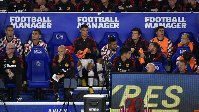 Cristiano Ronaldo Manchester United's Cristiano Ronaldo, center, sits on the bench during the English Premier League soccer match between Leicester City and Manchester United at King Power stadium in Leicester, England, Thursday, Sept. 1, 2022. (AP Photo/Rui Vieira)