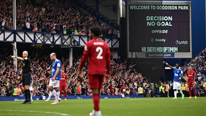 Liverpool After a VAR (Video Assistant Referee) review, Everton's English defender Conor Coady has his goal disallowed for offside during the English Premier League football match between Everton and Liverpool at Goodison Park in Liverpool, north west England on September 3, 2022. - RESTRICTED TO EDITORIAL USE. No use with unauthorized audio, video, data, fixture lists, club/league logos or 'live' services. Online in-match use limited to 120 images. An additional 40 images may be used in extra time. No video emulation. Social media in-match use limited to 120 images. An additional 40 images may be used in extra time. No use in betting publications, games or single club/league/player publications. (Photo by Oli SCARFF / AFP) / RESTRICTED TO EDITORIAL USE. No use with unauthorized audio, video, data, fixture lists, club/league logos or 'live' services. Online in-match use limited to 120 images. An additional 40 images may be used in extra time. No video emulation. Social media in-match use limited to 120 images. An additional 40 images may be used in extra time. No use in betting publications, games or single club/league/player publications. / RESTRICTED TO EDITORIAL USE. No use with unauthorized audio, video, data, fixture lists, club/league logos or 'live' services. Online in-match use limited to 120 images. An additional 40 images may be used in extra time. No video emulation. Social media in-match use limited to 120 images. An additional 40 images may be used in extra time. No use in betting publications, games or single club/league/player publications. (Photo by OLI SCARFF/AFP via Getty Images)