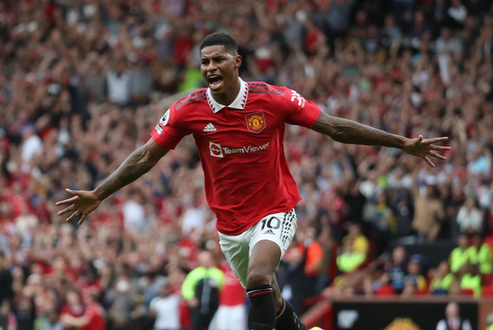 MANCHESTER, ENGLAND - SEPTEMBER 04: Marcus Rashford of Manchester United celebrates scoring their second goal during the Premier League match between Manchester United and Arsenal FC at Old Trafford on September 04, 2022 in Manchester, England. (Photo by Tom Purslow/Manchester United via Getty Images)