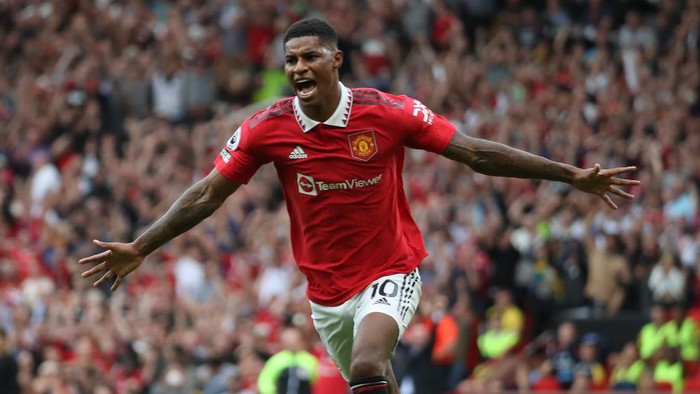 MANCHESTER, ENGLAND - SEPTEMBER 04: Marcus Rashford of Manchester United celebrates scoring their second goal during the Premier League match between Manchester United and Arsenal FC at Old Trafford on September 04, 2022 in Manchester, England. (Photo by Tom Purslow/Manchester United via Getty Images)