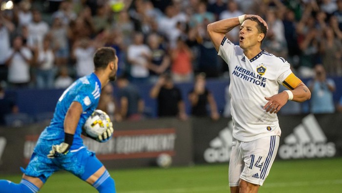 Chicharito CARSON, CA - SEPTEMBER 4: Javier HernΓ‘ndez #14 of Los Angeles Galaxy reacts after an unsuccessful paneka penalty kick that was saved by John Pulskamp #1 of Sporting Kansas City during the match at the Dignity Health Sports Park on September 4, 2022 in Carson, California. The match ended in a 2-2 tie. (Photo by Shaun Clark/Getty Images) *** Local Caption *** *** Local Caption *** Javier HernΓ‘ndez; John Pulskamp