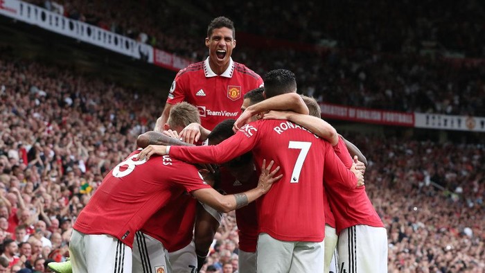 MANCHESTER, ENGLAND - SEPTEMBER 04: Marcus Rashford of Manchester United celebrates scoring their second goal during the Premier League match between Manchester United and Arsenal FC at Old Trafford on September 04, 2022 in Manchester, England. (Photo by Tom Purslow/Manchester United via Getty Images)