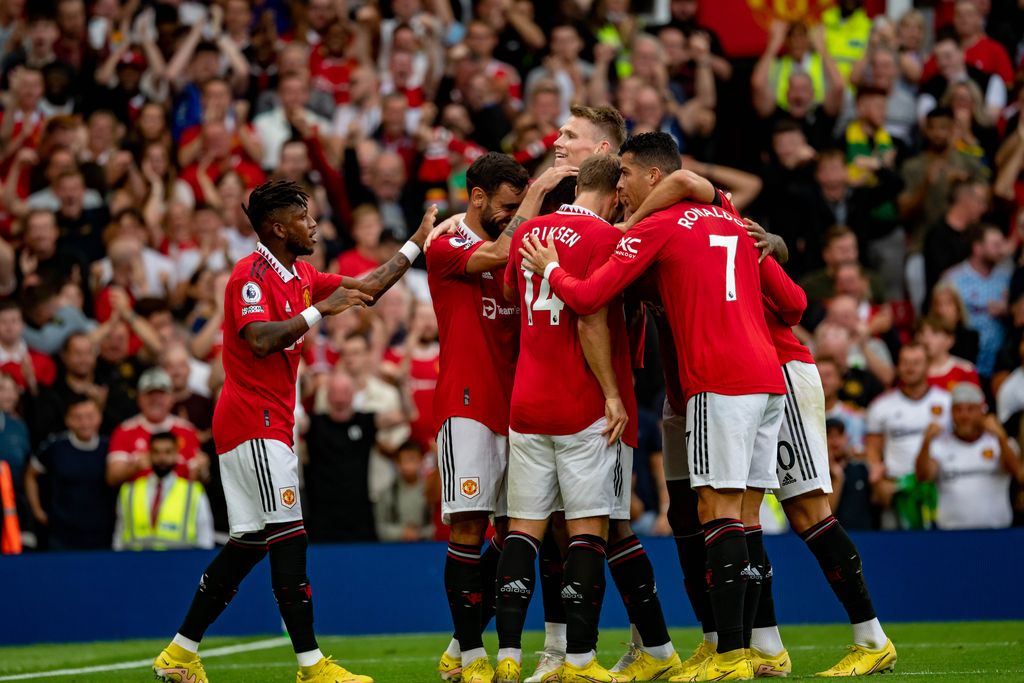 MANCHESTER, ENGLAND - SEPTEMBER 04:   Marcus Rashford of Manchester United celebrates scoring a goal with team-mates during  the Premier League match between Manchester United and Arsenal FC at Old Trafford on September 4, 2022 in Manchester, United Kingdom. (Photo by Ash Donelon/Manchester United via Getty Images)