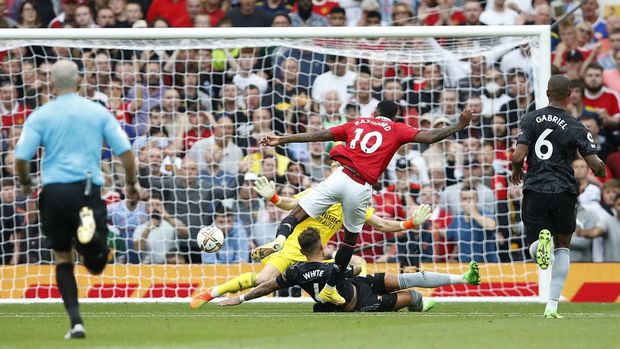 Soccer Football - Premier League - Manchester United v Arsenal - Old Trafford, Manchester, Britain - September 4, 2022 Manchester United's Marcus Rashford scores their second goal REUTERS/Craig Brough EDITORIAL USE ONLY. No use with unauthorized audio, video, data, fixture lists, club/league logos or 'live' services. Online in-match use limited to 75 images, no video emulation. No use in betting, games or single club /league/player publications.  Please contact your account representative for further details.