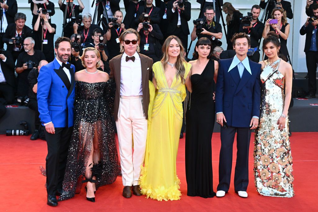 VENICE, ITALY - SEPTEMBER 05: (L-R) Nick Kroll, Florence Pugh, Chris Pine, Olivia Wilde, Sydney Chandler, Harry Styles and Gemma Chan attend the 