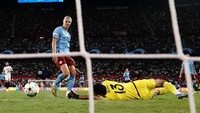 Dibantu dengan kontribusi Haaland, Man City pulang dari markas Sevillla dengan kemengan 4-0. Foto: PA Images via Getty Images/Nick Potts - PA Images