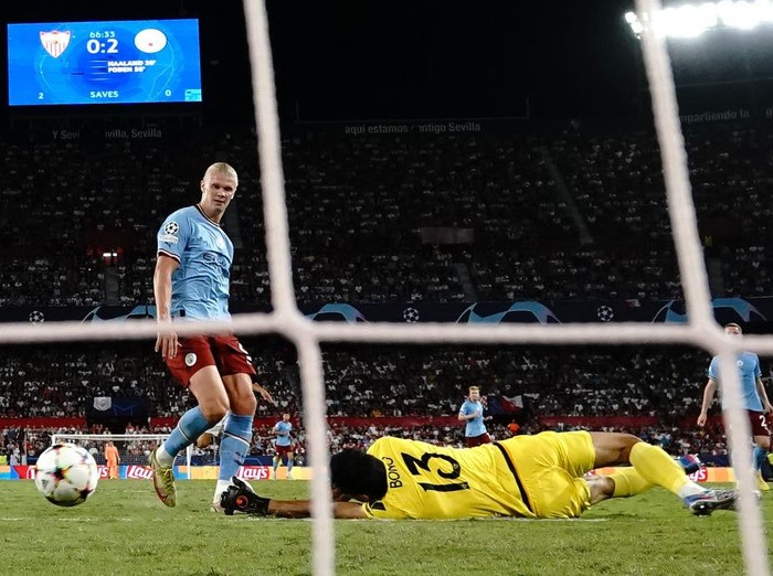 Manchester City's Erling Haaland scores their side's third goal of the game during the UEFA Champions League Group G match at the Ramon Sanchez Pizjuan Stadium in Seville, Spain. Picture date: Tuesday September 6, 2022. (Photo by Nick Potts/PA Images via Getty Images)