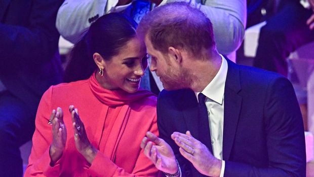 Britain's Meghan, Duchess of Sussex gestures as she delivers a speech on stage during the annual One Young World Summit at Bridgewater Hall in Manchester, north-west England on September 5, 2022. - The One Young World Summit is a global forum for young leaders, bringing together young people from over 190 countries around the world to come together to confront the biggest challenges facing humanity. (Photo by Oli SCARFF / AFP) (Photo by OLI SCARFF/AFP via Getty Images)