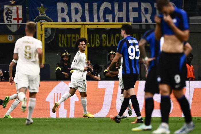 Bayern Munichs German midfielder Leroy Sane (C) celebrates after scoring a goal during the UEFA Champions League Group C football match between Inter Milan and Bayern Munich in Milan, on September 7, 2022. (Photo by Marco BERTORELLO / AFP) (Photo by MARCO BERTORELLO/AFP via Getty Images)
