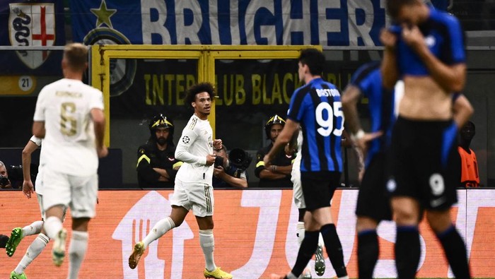 Bayern Munichs German midfielder Leroy Sane (C) celebrates after scoring a goal during the UEFA Champions League Group C football match between Inter Milan and Bayern Munich in Milan, on September 7, 2022. (Photo by Marco BERTORELLO / AFP) (Photo by MARCO BERTORELLO/AFP via Getty Images)
