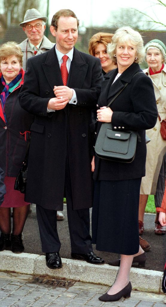 Camilla Parker Bowles and Prince Charles walk out of the Ritz January 28, 1999. More than 100 photographers took up positions outside London's Ritz hotel for the most elusive shot of all -- Prince Charles together with his long-time lover Camilla Parker Bowles. (photo by UK Press)