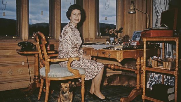 Queen Elizabeth II at the writing desk in her study in Balmoral Castle, Scotland, 1972. (Photo by Keystone/Hulton Archive/Getty Images)