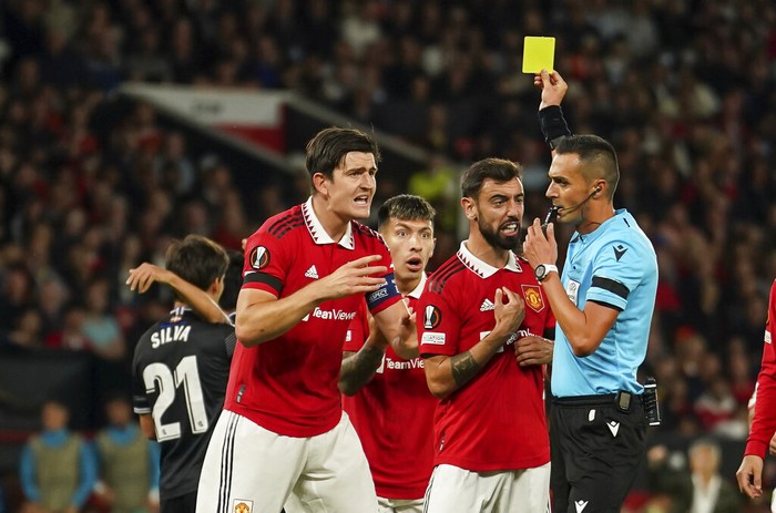 Manchester United players appeal to the referee after a penalty was given to Real Sociedad during group E Europa League soccer match between Manchester United and Real Sociedad at Old Trafford in Manchester, England, Thursday, Sept. 8, 2022. (AP Photo/Dave Thompson)