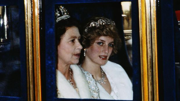 The Princess of Wales and the Queen attend the Opening of Parliament in London, November 1982. Diana is wearing a white fur coat and the Spencer tiara. (Photo by Terry Fincher/Princess Diana Archive/Getty Images)