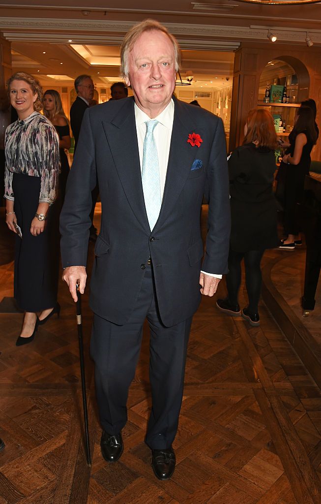 487642869 BLANDFORD FORUM, UNITED KINGDOM - MAY 01: (EMBARGOED FOR PUBLICATION IN UK NEWSPAPERS UNTIL 48 HOURS AFTER CREATE DATE AND TIME) Andrew Parker Bowles attends the funeral of Mark Shand at Holy Trinity Church, Stourpaine on May 1, 2014 near Blandford Forum in Dorset, England. Conservationist and travel writer Mark Shand, brother of Camilla, Duchess of Cornwall, died unexpectedly last week after falling and hitting his head in New York. (Photo by Max Mumby/Indigo/Getty Images)
