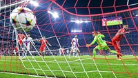 Kemenangan Die Roten ditentukan oleh gol-gol dari Lucas Hernandez dan Leroy Sane di babak kedua. (AP/Sven Hoppe)