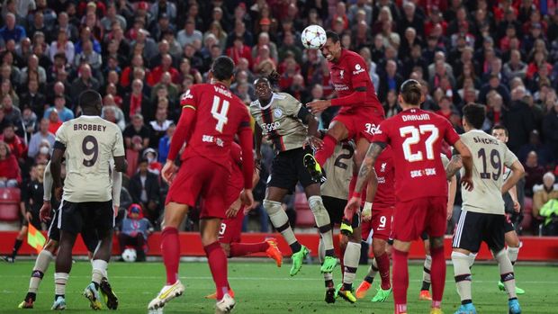 LIVERPOOL, ENGLAND - SEPTEMBER 13:  Joel Matip of Liverpool scores thier 2nd goal during the UEFA Champions League group A match between Liverpool FC and AFC Ajax at Anfield on September 13, 2022 in Liverpool, United Kingdom. (Photo by Marc Atkins/Getty Images)