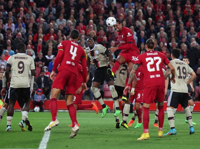 LIVERPOOL, ENGLAND - SEPTEMBER 13:  Joel Matip of Liverpool scores thier 2nd goal during the UEFA Champions League group A match between Liverpool FC and AFC Ajax at Anfield on September 13, 2022 in Liverpool, United Kingdom. (Photo by Marc Atkins/Getty Images)