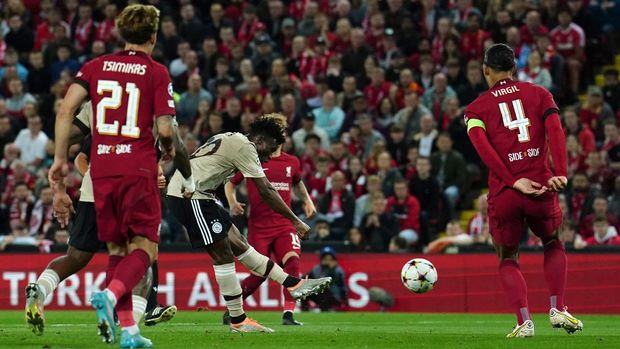 Ajax's Mohammed Kudus scores their side's first goal of the game during the UEFA Champions League match at Anfield, Liverpool. Picture date: Tuesday September 13, 2022. (Photo by Martin Rickett/PA Images via Getty Images)