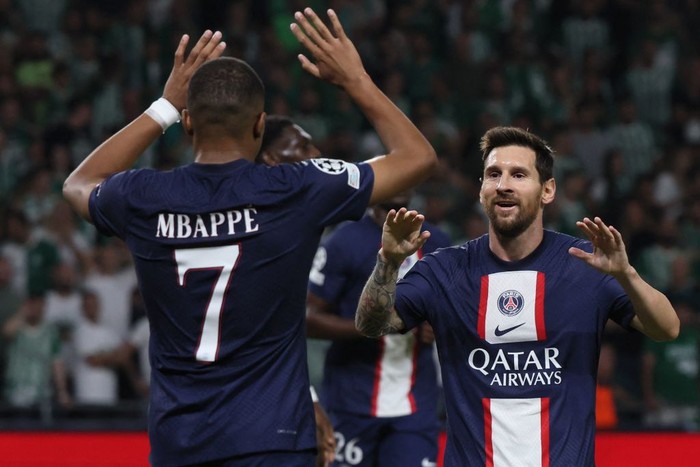 Paris Saint-Germain's Argentine forward Lionel Messi (R) celebrates scoring the equaliser with Paris Saint-Germain's French forward Kylian Mbappe during the UEFA Champions League group H football match between Israel's Maccabi Haifa and France's Paris Saint-Germain (PSG) at the Sammy Ofer stadium in the city of Haifa on September 14, 2022. (Photo by JACK GUEZ / AFP) (Photo by JACK GUEZ/AFP via Getty Images)