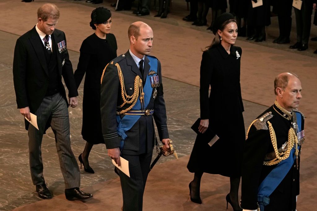 LONDON, UNITED KINGDOM - SEPTEMBER 14: (EMBARGOED FOR PUBLICATION IN UK NEWSPAPERS UNTIL 24 HOURS AFTER CREATE DATE AND TIME) Prince Harry, Duke of Sussex walks behind Queen Elizabeth II's coffin as it is transported on a gun carriage from Buckingham Palace to The Palace of Westminster ahead of her Lying-in-State on September 14, 2022 in London, United Kingdom. Queen Elizabeth II's coffin is taken in procession on a Gun Carriage of The King's Troop Royal Horse Artillery from Buckingham Palace to Westminster Hall where she will lay in state until the early morning of her funeral. Queen Elizabeth II died at Balmoral Castle in Scotland on September 8, 2022, and is succeeded by her eldest son, King Charles III. (Photo by Max Mumby/Indigo/Getty Images)