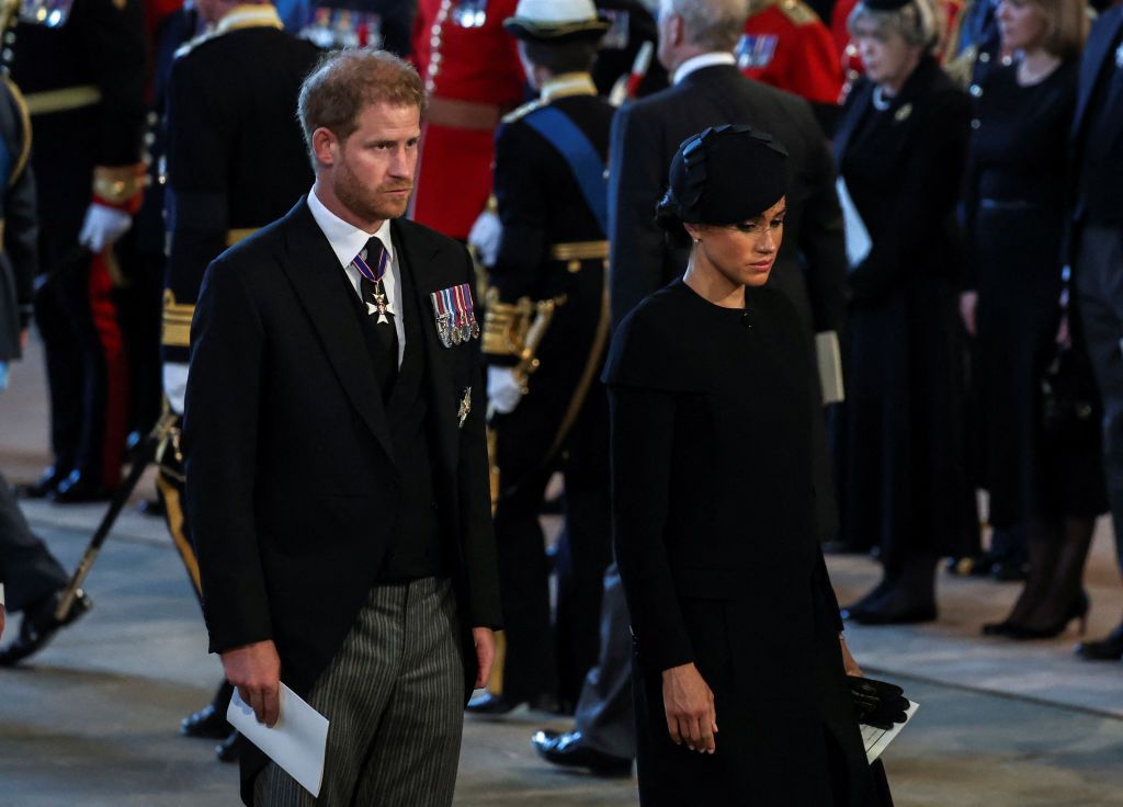 LONDON, UNITED KINGDOM - SEPTEMBER 14: (EMBARGOED FOR PUBLICATION IN UK NEWSPAPERS UNTIL 24 HOURS AFTER CREATE DATE AND TIME) Prince Harry, Duke of Sussex walks behind Queen Elizabeth II's coffin as it is transported on a gun carriage from Buckingham Palace to The Palace of Westminster ahead of her Lying-in-State on September 14, 2022 in London, United Kingdom. Queen Elizabeth II's coffin is taken in procession on a Gun Carriage of The King's Troop Royal Horse Artillery from Buckingham Palace to Westminster Hall where she will lay in state until the early morning of her funeral. Queen Elizabeth II died at Balmoral Castle in Scotland on September 8, 2022, and is succeeded by her eldest son, King Charles III. (Photo by Max Mumby/Indigo/Getty Images)