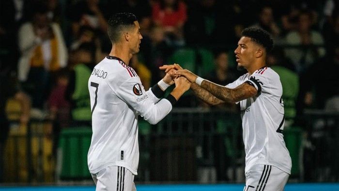 Cristiano Ronaldo, Jadon Sancho CHISINAU, MOLDOVA - SEPTEMBER 15: Cristiano Ronaldo and Jadon Sancho of Manchester United walk out ahead of the UEFA Europa League group E match between Sheriff Tiraspol and Manchester United at Stadionul Zimbru on September 15, 2022 in Chisinau, Moldova. (Photo by Ash Donelon/Manchester United via Getty Images)