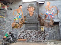 Makna Mural Jokowi Pegang Wayang Presiden Rusia-Ukraina di Solo