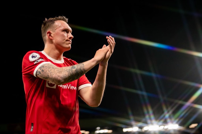 MANCHESTER, ENGLAND - APRIL 28:  Phil Jones of Manchester United applauds at the end of the Premier League match between Manchester United and Chelsea at Old Trafford on April 28, 2022 in Manchester, United Kingdom. (Photo by Ash Donelon/Manchester United via Getty Images)