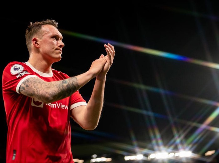 MANCHESTER, ENGLAND - APRIL 28:  Phil Jones of Manchester United applauds at the end of the Premier League match between Manchester United and Chelsea at Old Trafford on April 28, 2022 in Manchester, United Kingdom. (Photo by Ash Donelon/Manchester United via Getty Images)