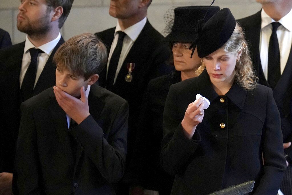 LONDON, ENGLAND - SEPTEMBER 14: James, Viscount Severn and Lady Louise Windsor pay their respects in The Palace of Westminster during the procession for the Lying-in State of Queen Elizabeth II on September 14, 2022 in London, United Kingdom. Queen Elizabeth II's coffin is taken in procession on a Gun Carriage of The King's Troop Royal Horse Artillery from Buckingham Palace to Westminster Hall where she will lay in state until the early morning of her funeral. Queen Elizabeth II died at Balmoral Castle in Scotland on September 8, 2022, and is succeeded by her eldest son, King Charles III. (Photo by Ian Vogler - WPA Pool/Getty Images)
