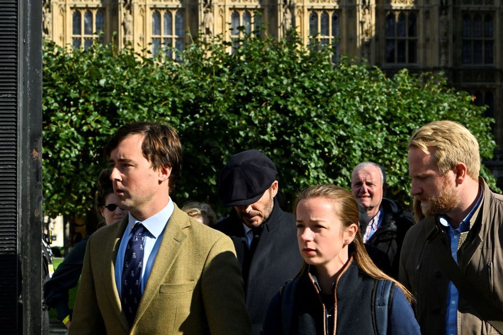 English former football player David Beckham leaves Westminster Hall, at the Palace of Westminster, in London on September 16, 2022 after paying his respects to the coffin of Queen Elizabeth II as it Lies in State. - Queen Elizabeth II will lie in state in Westminster Hall inside the Palace of Westminster, until 0530 GMT on September 19, a few hours before her funeral, with huge queues expected to file past her coffin to pay their respects. (Photo by Louisa Gouliamaki / AFP) (Photo by LOUISA GOULIAMAKI/AFP via Getty Images)