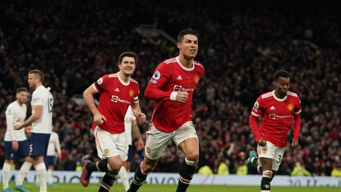 Manchester United's Cristiano Ronaldo celebrates scoring his hat trick goal and his sides third goal of the game during the Premier League match at Old Trafford, Manchester. Picture date: Saturday March 12, 2022. (Photo by Martin Rickett/PA Images via Getty Images)