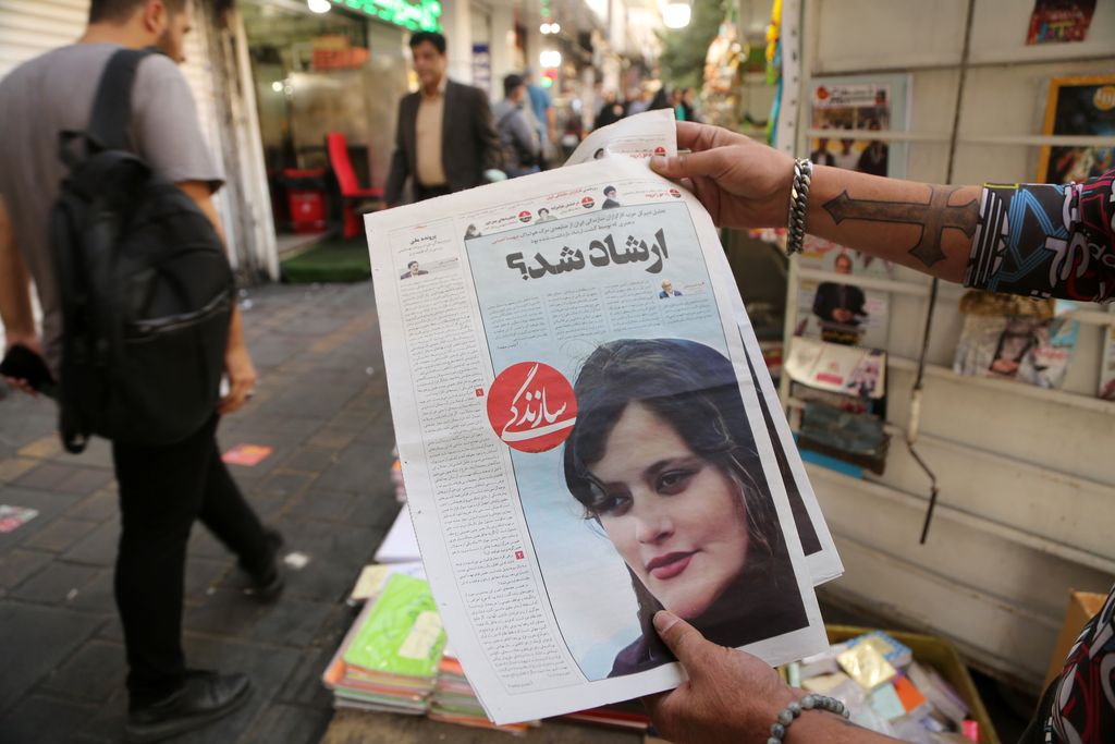TEHRAN, IRAN - SEPTEMBER 18: A view of Iranian newspapers with headlines of the death of 22 years old Mahsa Amini who died after being arrested by morality police allegedly not complying with strict dress code in Tehran, Iran on September 18, 2022. (Photo by Fatemeh Bahrami/Anadolu Agency via Getty Images)