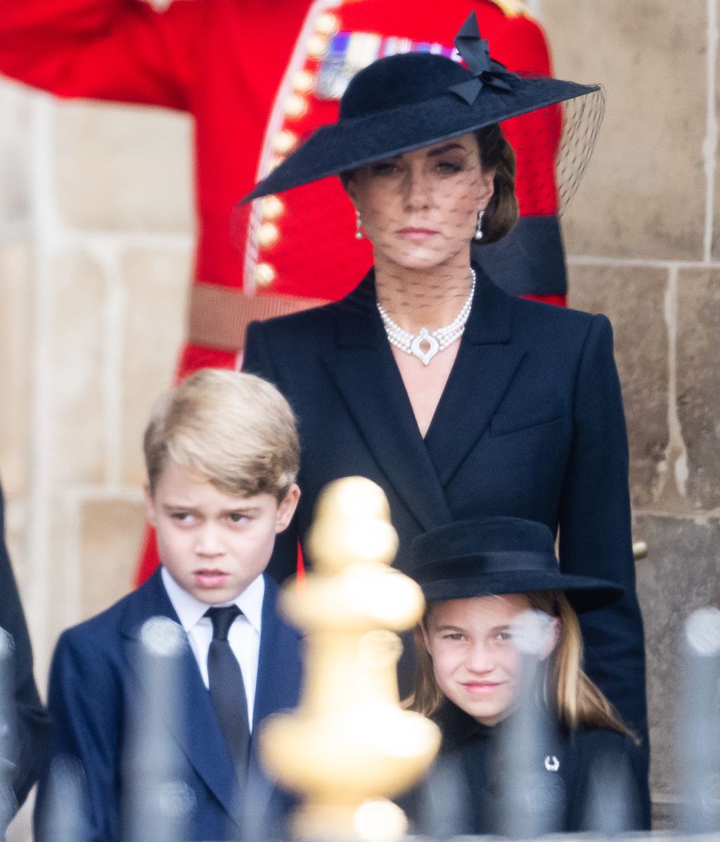 LONDON, ENGLAND - SEPTEMBER 19: Catherine, Princess of Wales, Prince George of Wales and Princess Charlotte of Wales during the State Funeral of Queen Elizabeth II at Westminster Abbey on September 19, 2022 in London, England. Elizabeth Alexandra Mary Windsor was born in Bruton Street, Mayfair, London on 21 April 1926. She married Prince Philip in 1947 and ascended the throne of the United Kingdom and Commonwealth on 6 February 1952 after the death of her Father, King George VI. Queen Elizabeth II died at Balmoral Castle in Scotland on September 8, 2022, and is succeeded by her eldest son, King Charles III. (Photo by Samir Hussein/WireImage)