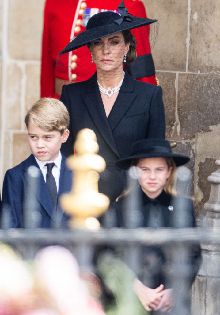 1243356712 LONDON, ENGLAND - SEPTEMBER 19: Catherine, Princess of Wales is seen in a car during the State Funeral of Queen Elizabeth II at Westminster Abbey on September 19, 2022 in London, England. Elizabeth Alexandra Mary Windsor was born in Bruton Street, Mayfair, London on 21 April 1926. She married Prince Philip in 1947 and ascended the throne of the United Kingdom and Commonwealth on 6 February 1952 after the death of her Father, King George VI. Queen Elizabeth II died at Balmoral Castle in Scotland on September 8, 2022, and is succeeded by her eldest son, King Charles III. (Photo by Sarah Meyssonnier - WPA Pool/Getty Images)
