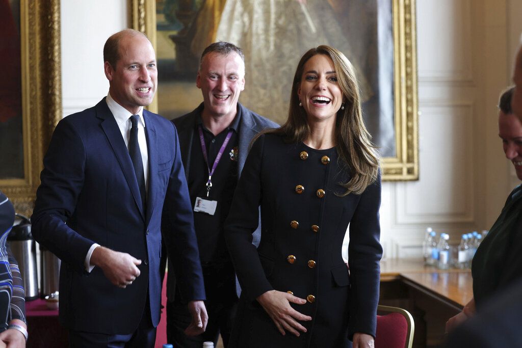 Kate, Princess of Wales, meets volunteers and operational staff who were involved in facilitating the Committal Service for Queen Elizabeth II at St George's Chapel, at Windsor Guildhall, Berkshire, Thursday, Sept. 22, 2022. (Ian Vogler/Pool Photo via AP)