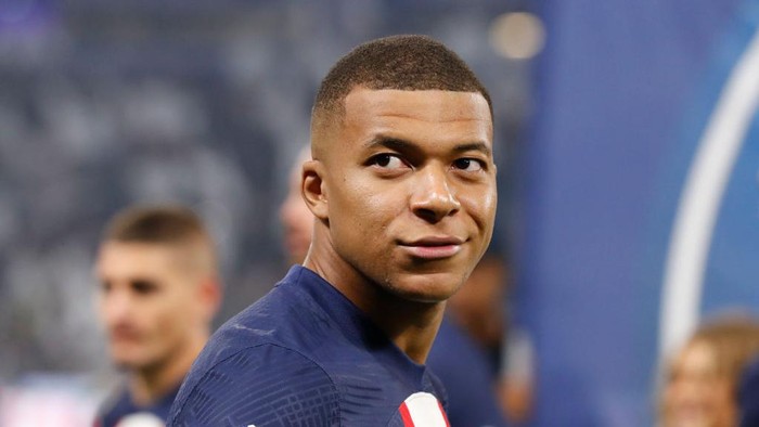 Kylian Mbappe LYON, FRANCE - SEPTEMBER 18: Kylian Mbappe #7 of Paris Saint-Germain looks on before the Ligue 1 match between Olympique Lyonnais and Paris Saint-Germain at Groupama Stadium on September 18, 2022 in Lyon, France. (Photo by Catherine Steenkeste/Getty Images)