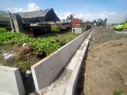 Warga Pengambengan Lega, Pemukiman Langganan Banjir Dibangun Drainase