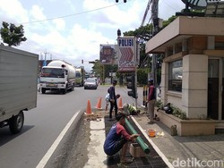 Penjelasan Soal Traffic Light Pendek Malang Numpang di Papan Nama Polisi