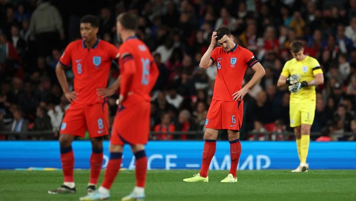 LONDON, ENGLAND - SEPTEMBER 26: Harry Maguire of England reacts after Kai Havertz (not pictured) of Germany scores their team's second goal during the UEFA Nations League League A Group 3 match between England and Germany at Wembley Stadium on September 26, 2022 in London, England. (Photo by Eddie Keogh - The FA/The FA via Getty Images)