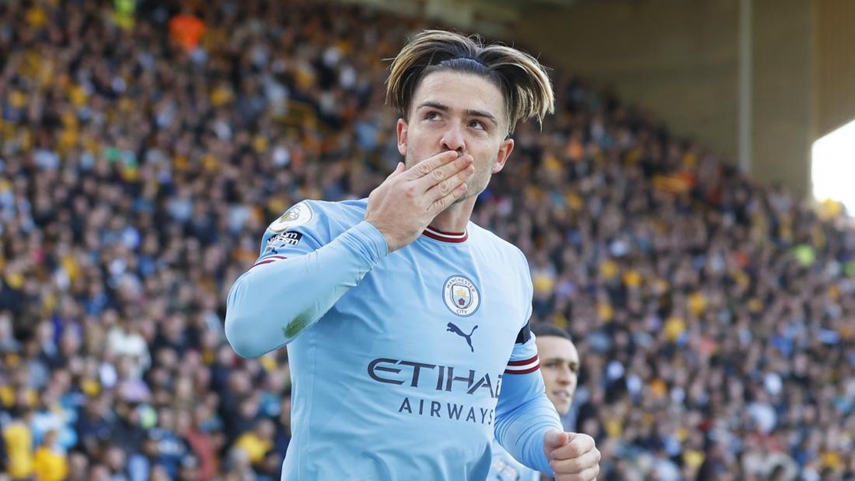 Jack Grealish berterima kasih ke Pep Guardiola. (Foto: Manchester City FC via Getty Ima/Lynne Cameron - Manchester City)