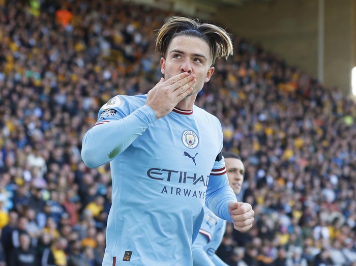 WOLVERHAMPTON, ENGLAND - SEPTEMBER 17: Jack Grealish of Manchester City celebrates after scoring their side's first goal during the Premier League match between Wolverhampton Wanderers and Manchester City at Molineux on September 17, 2022 in Wolverhampton, England. (Photo by Lynne Cameron - Manchester City/Manchester City FC via Getty Images)